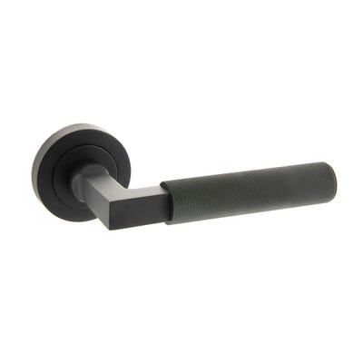 Millhouse Brass Cartwright Designer Lever on Round Rose - Matt Black