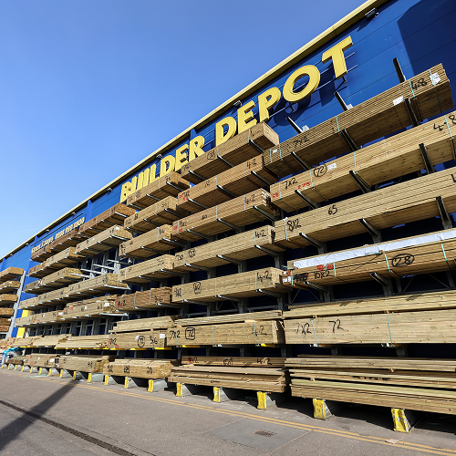 Builder Depot’s timber selection in their New Southgate branch. In the image, there are aisles of carcassing and planed timber.